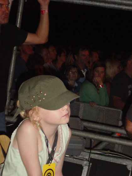 Ella.  Looking very cool at the Sydney Stadium. Chap on left, not so cool.