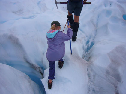 Ella following 'Goose' up the glacier.  The ice is 100m thick at this relatively flat area of the Franz Josef.  We are about midway up the 11km long glacier.