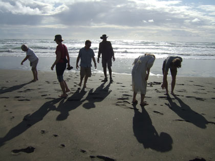 Karekare beach.  Stunning black sand and lush cliffs.<br />
Paddy Gabby Dave Sherif Steph Bart.<br />
Photo by Jez Webb.