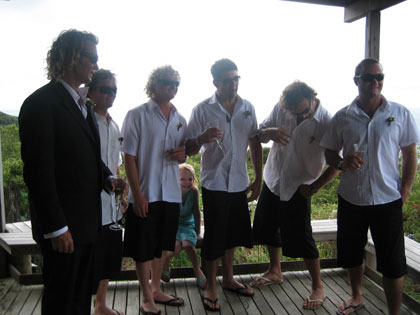 We've never seen so many pairs of shorts and flip flops worn on a wedding day......check out Ella hangin' with the boys!