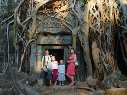 Banyon trees have a firm grip on the ruins of this maze like temple.